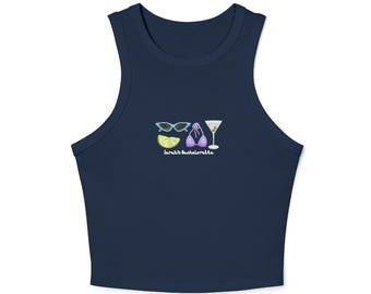 May include: A navy blue tank top with a white graphic of sunglasses, a bikini, a lime wedge, and a martini glass. The text "Sarah's Bachelorette" is printed below the graphic.