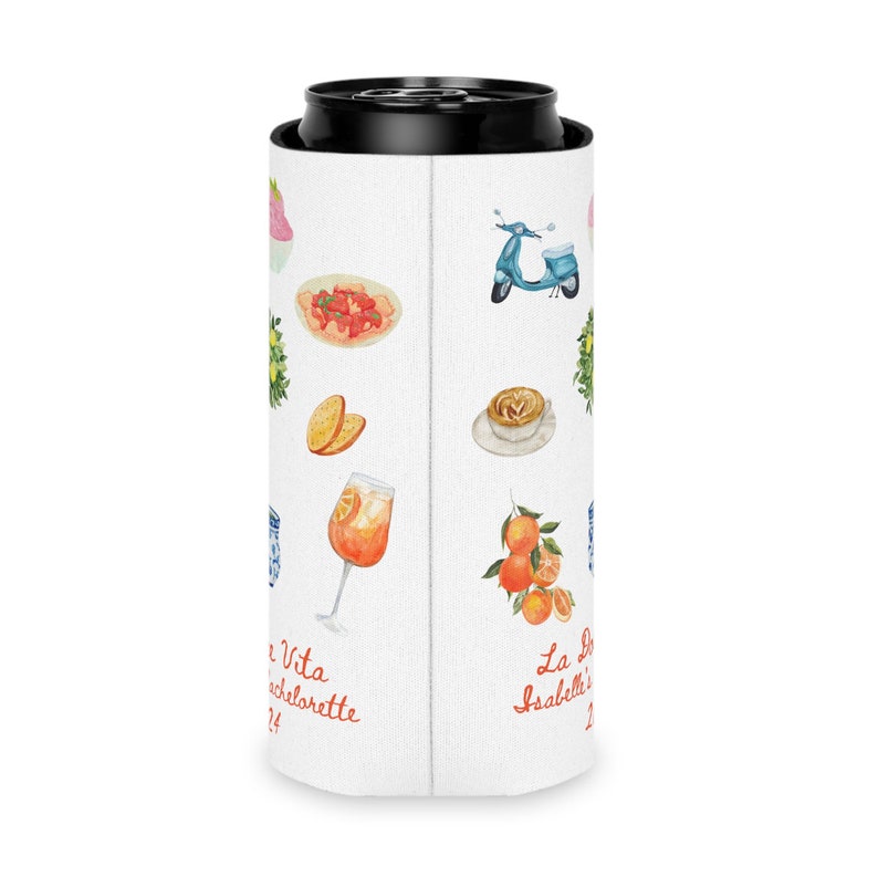 May include: White can cooler with a variety of colorful illustrations, including a scooter, a glass of orange juice, a plate of pasta, and a cup of coffee. The text "La Dolce Vita" and "Isabella's Bachelorette 2024" is printed on the cooler.