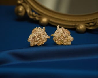 Pendientes vintage con forma de diablo en oro amarillo de 18 quilates.