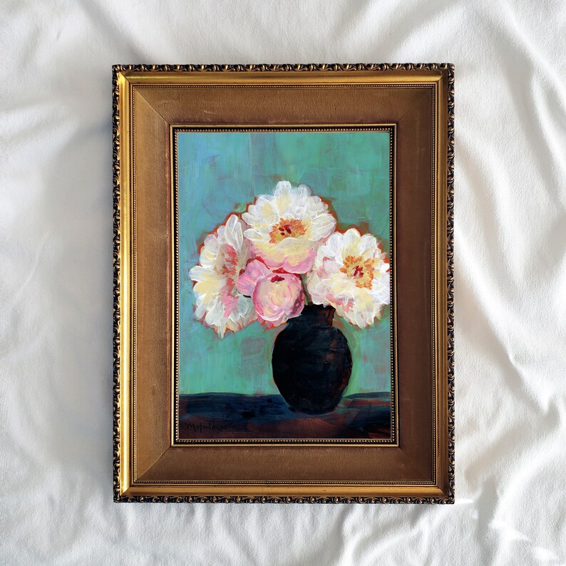 May include: A framed painting of a bouquet of white and pink flowers in a black vase against a teal background.