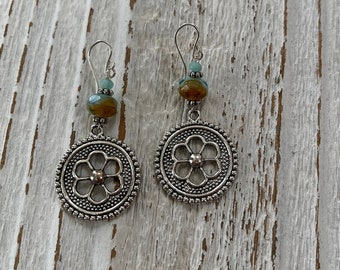 Floral disc and crystal dangle earrings