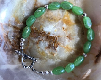 Pretty green bracelet with sterling silver beads and toggle clasp