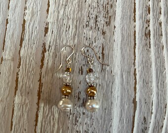 Neutral colored brass dangle earrings