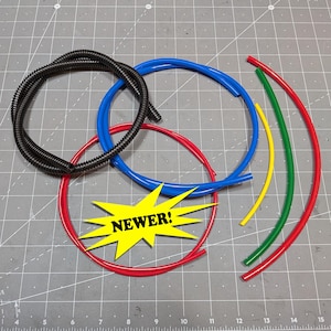 Juego de tubos para mochila de protones