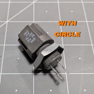 May include: A gray Dale 25W PH-25A 25&Omega; 3/8 9320 resistor with two silver-colored leads.