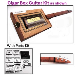 May include: A cigar box guitar kit with a wooden box, neck, and parts kit. The box features a "JAVA" label and a hinged lid. The parts kit includes strings and other components. The text "Cigar Box Guitar Kit as shown" is visible.