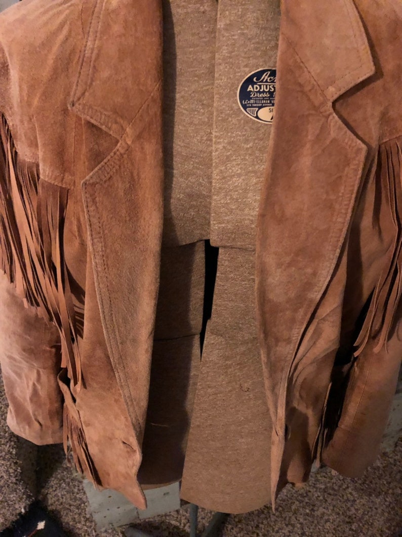 Tan Suede Fringe Jacket Size small.