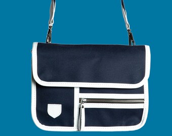 Leather and canvas saddle bag handbag