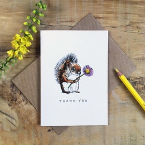 Carte de remerciement Écureuil avec une fleur