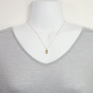 Small Gold Cowrie Shell Charm Necklace