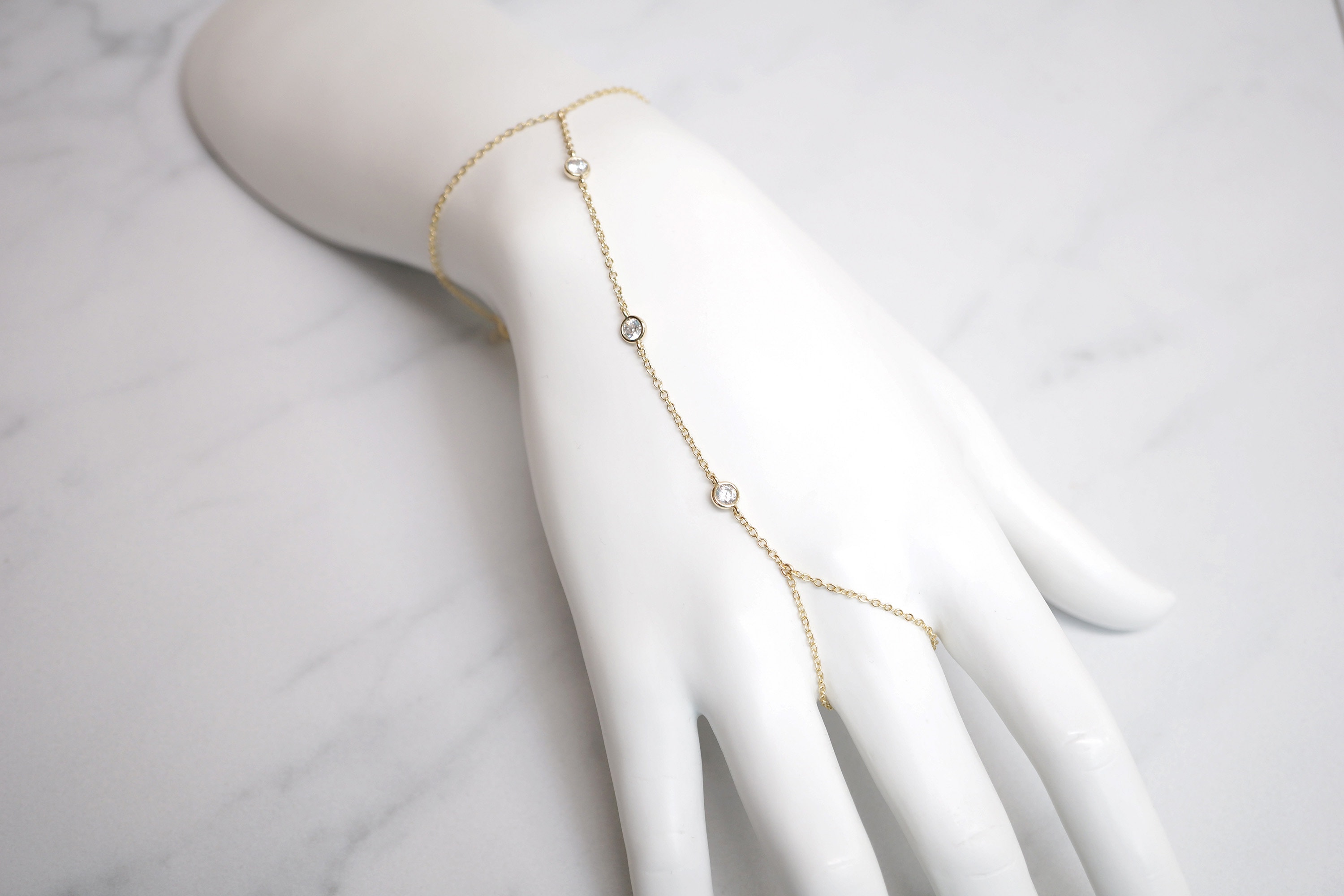 Gold Over Sterling Silver 3 CZ Hand Chain