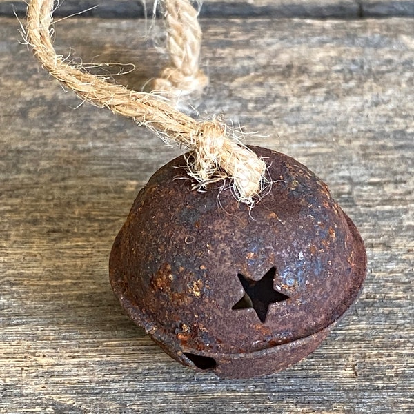 Rusty Tin Jingle Bell Ornament w/Star Cutouts and Jute Hanger. 1" Jingle Bell Ornament.