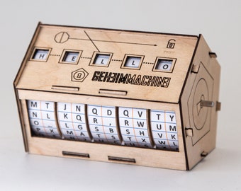 SecretMachine, speelgoed voor mechanische encryptie van geheime teksten Mini Enigma