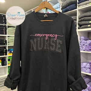 Black Glitter Appliqué Emergency Nurse Embroidered Sweatshirt, Black Pullover Sweater with Custom Color Embroidered Emergency Specialty.