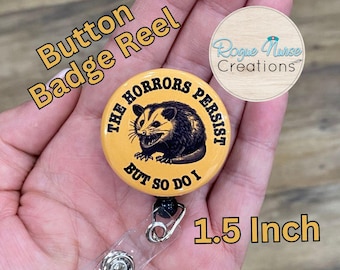 The Horrors Persist But So Do I, Opossum Button Style Retractable Badge Reel, Yellow Background, Opossum Button Badge Holder