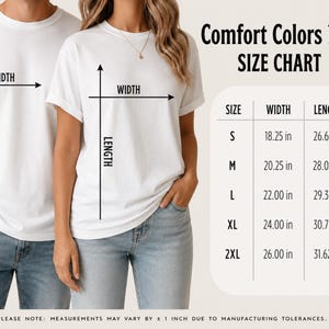 May include: Two people wearing white t-shirts and blue jeans. The image includes a size chart for Comfort Colors 1717 shirts, with measurements in inches for width and length, ranging from size S to 2XL. The text also notes that measurements may vary by &plusmn; 1 inch.