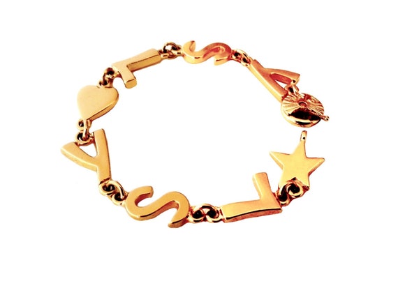 CASSANDRE heart charm bracelet in metal and rhinestone | Saint Laurent | YSL .com