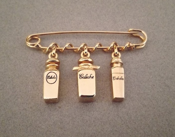 Hermes brooch pin deals