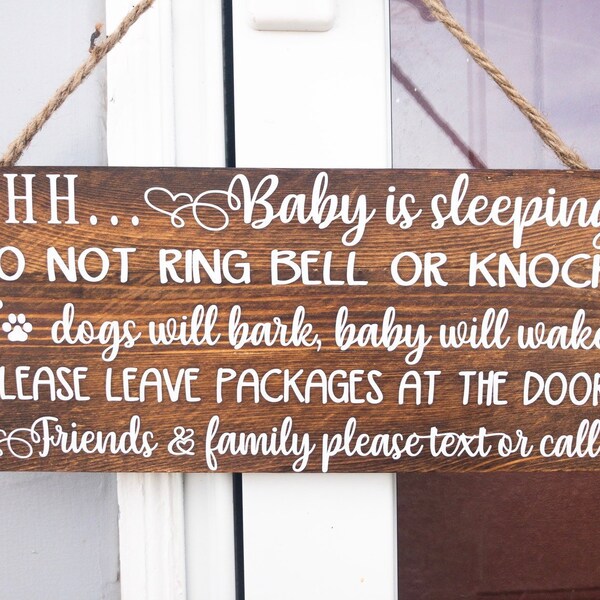 Shh baby is sleeping do not ring bell or knock, dogs will bark, baby will wake, please leave packages at the door.. wooden front door sign