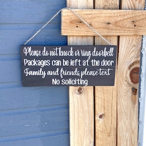 Please do not knock or ring doorbell sign / Packages can be left at the door / Family and Friends please text / No soliciting door sign