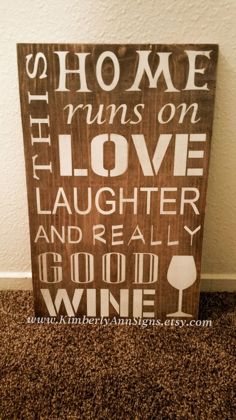 Download This home runs on love laughter and really good wine ...