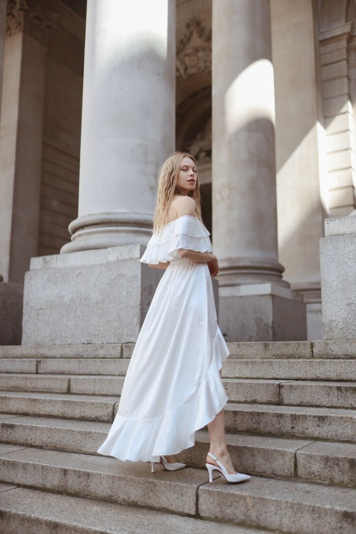 off white flowy dress Had to tick frolicking in a white flowy dress this summer off my list too   . . White slowly summer maxi dress, eurosummer white dress outfit, white  off shoulder maxi dress,