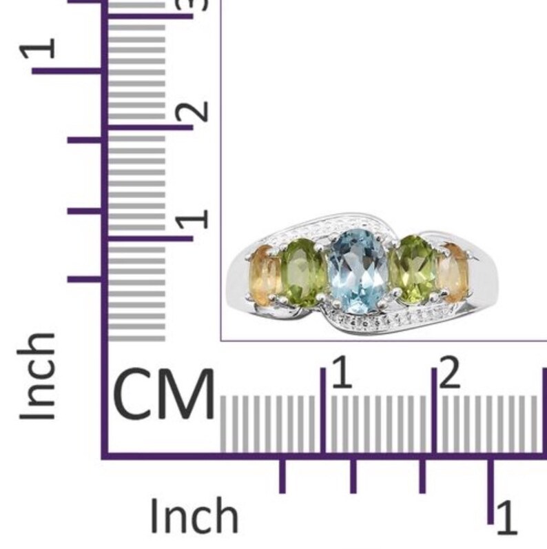 Hebei Peridot and Citrine Ring in Sterling Silver size M A Sky Blue Topaz