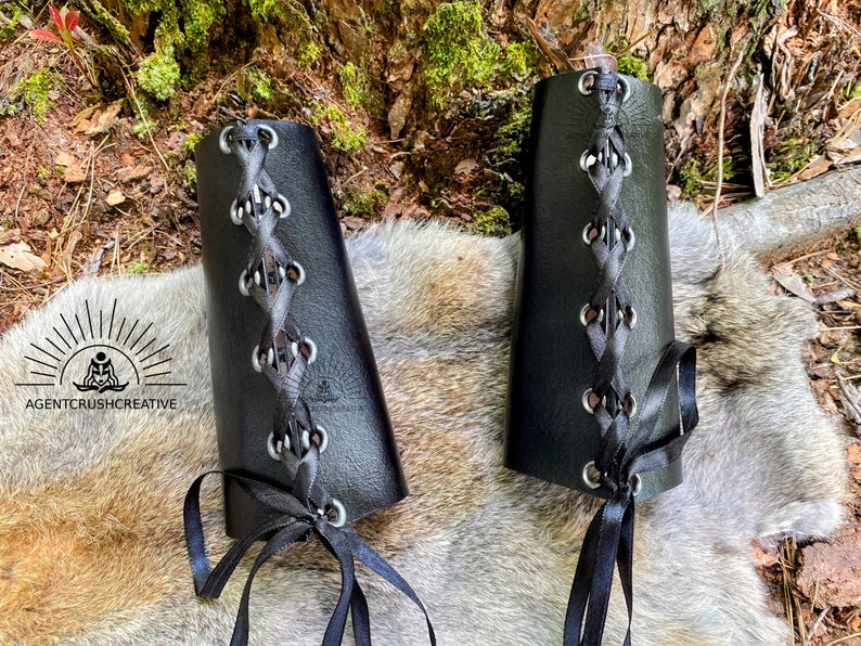 Leather bracers showing the lacing and grommets