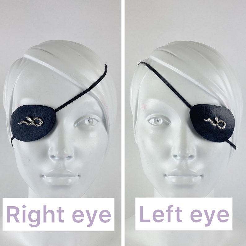 May include: A black eye patch with a rhinestone snake design. The eye patch is shown on a mannequin head, with the patch covering the right eye in one image and the left eye in the other image. The text "Right eye" and "Left eye" is printed below each image.