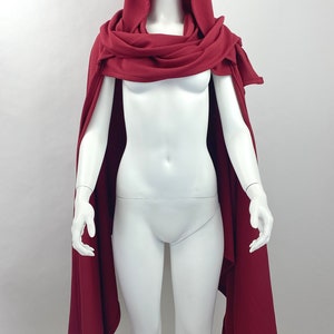 Style: scarf piece sitting on the shoulders and neck like a regular scarf