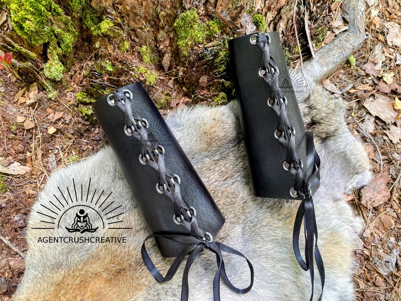 Leather bracers showing the lacing and grommets