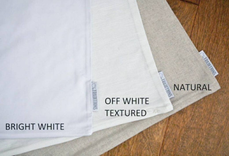 May include: Three fabric swatches in different shades of white. The swatches are labeled "Bright White", "Off White Textured", and "Natural".
