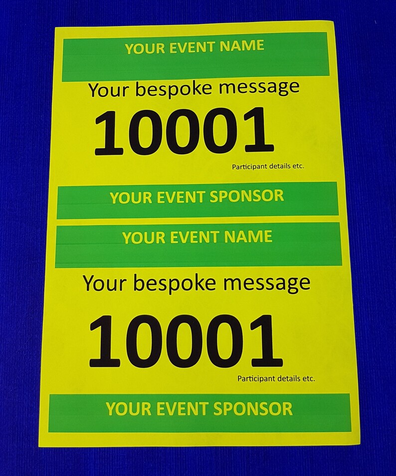 May include: A yellow and green race bib with the text "YOUR EVENT NAME" and "YOUR EVENT SPONSOR" in green. The number "10001" is printed in black on the bib. The text "Your bespoke message" is printed in black on the bib.