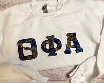 Celestial Greek Lettered Stitched Shirt: Sun, Moon, Stars