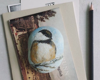 Hand painted bird, beach rock art.