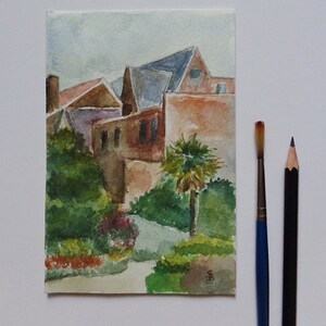 Small postcard watercolor landscape painting. View from a garden.