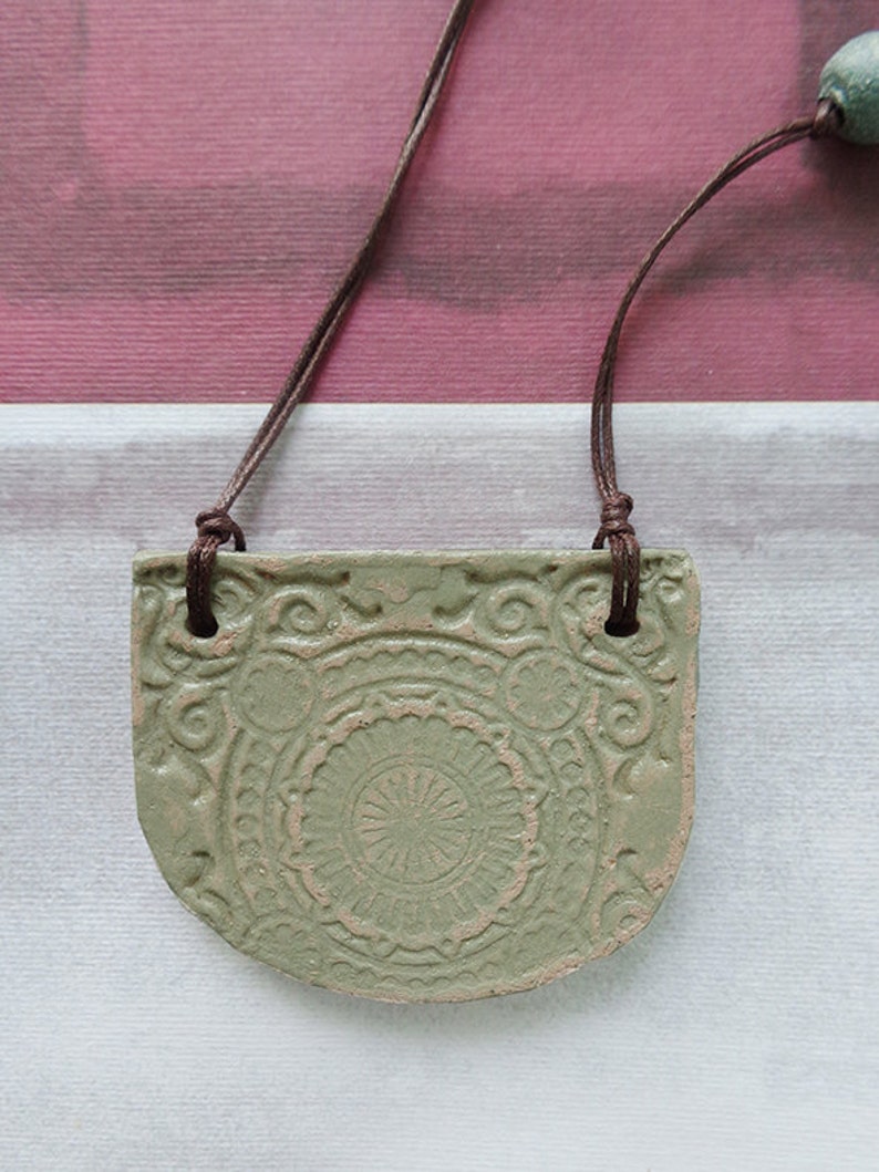 Light green ceramic handmade pendant with imprint. One of a | Etsy