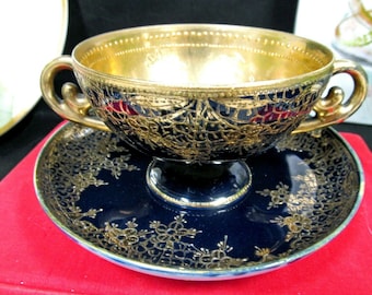 Nippon tea cup and saucer raised gold double handle teacup footed cobalt blue