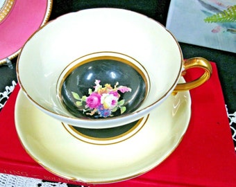 STANLEY tea cup and saucer Painted pink rose center black & pale yellow teacup