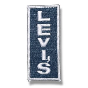 May include: A white "LEVI'S" logo patch on a dark blue denim background. The patch has a white border.