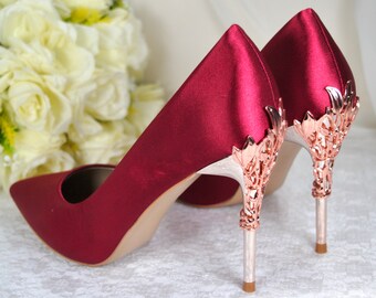 Burgundy and 2025 gold high heels