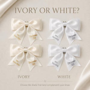 May include: Four satin bows arranged in two columns, labeled IVORY OR WHITE? at the top. The left column shows two ivory bows personalized with Mrs Helen West and 23rd October 2021. The right column shows two white bows with Mrs Manning and 27th October 2021.