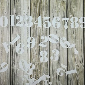 Découpes de matrices de numéros de papier - Découpe de numéros de papier - Numéros de papier - Découpe de matrices de papier - Numéros de stock de cartes - Numéros - Numéro de papier blanc - Numéro un
