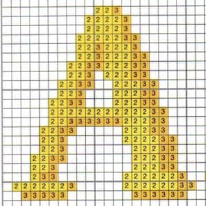 May include: A pixelated image of the letter "A" in a cross-stitch pattern. The letter is primarily yellow and gold, with some areas in shades of brown. The design is on a grid.