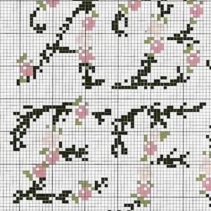 May include: A cross-stitch pattern featuring a repeating design of pink flowers and green leaves on a white background.