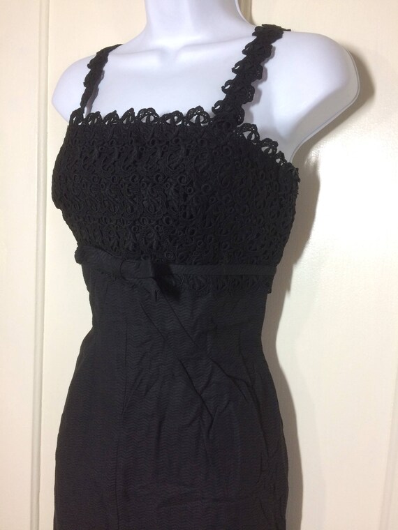 1940s bombshell Black Cocktail Dress with Bow look