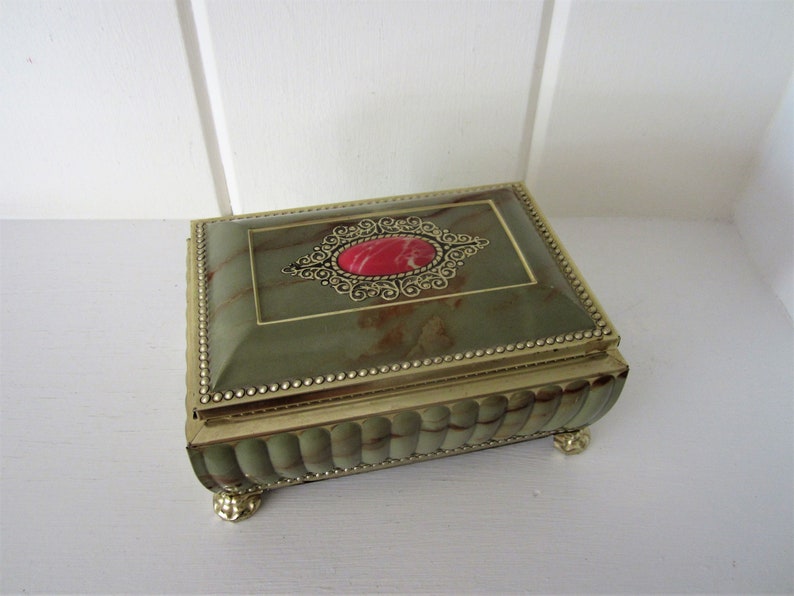 metal box with hinged lid