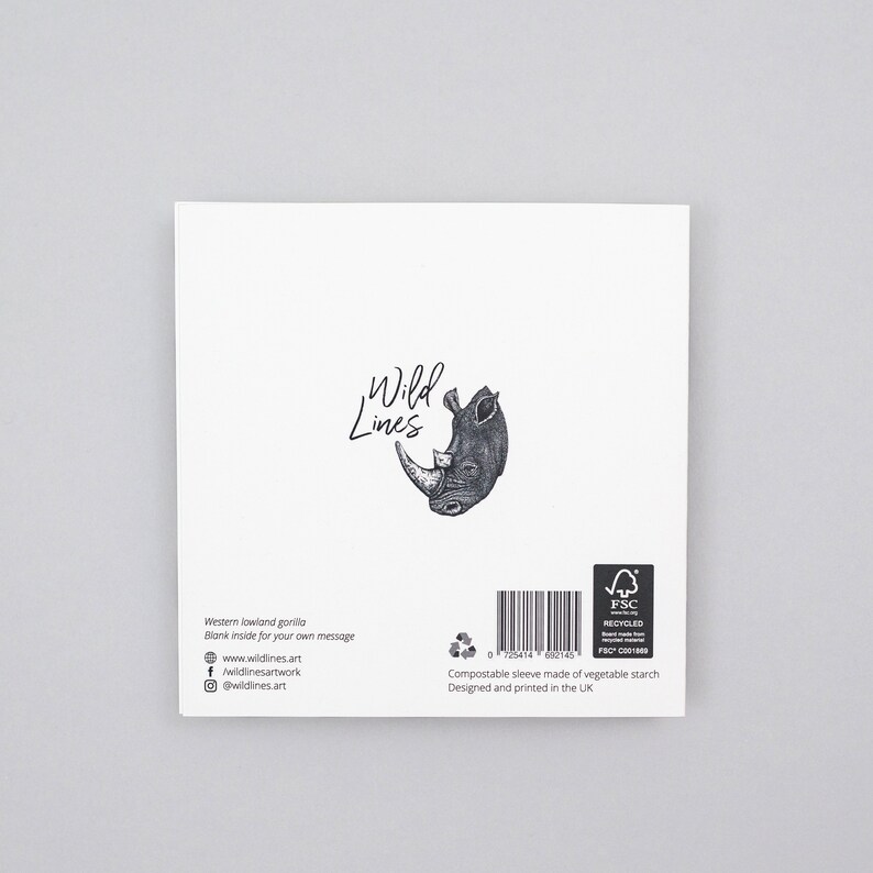 May include: A blank greeting card with a black and white illustration of a rhinoceros on the back. The card is from Wild Lines and has a compostable sleeve made of vegetable starch. The card is designed and printed in the UK.