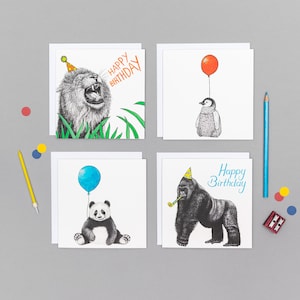 May include: Set of four greeting cards featuring animal illustrations. The cards are white with black ink drawings of a lion, a penguin, a panda, and a gorilla. Each card has a birthday message and a party hat on the animal.