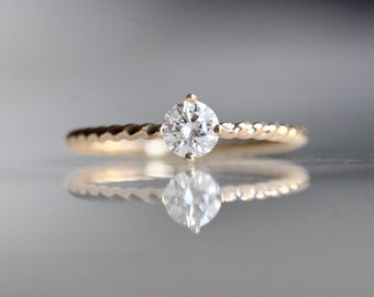 14K Gold Diamond Solitaire "Twist" Engagement Ring